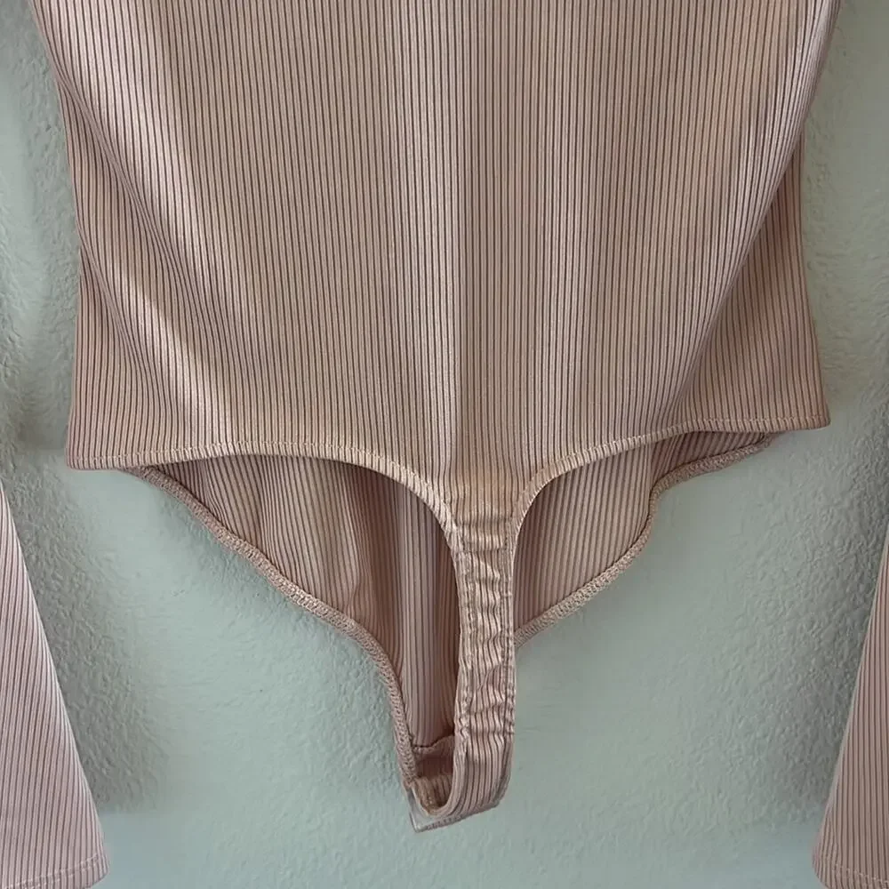 NWT Free People Intimately Charli Bodysuit Mini RIbbed Pink Statement Sleeve S